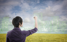 A woman drawing on a transparent board. A woman drawing on a transparent board.