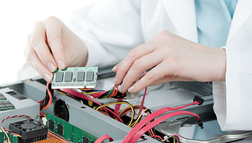 A female engineer tests a product in a laboratory. A female engineer tests a product in a laboratory.