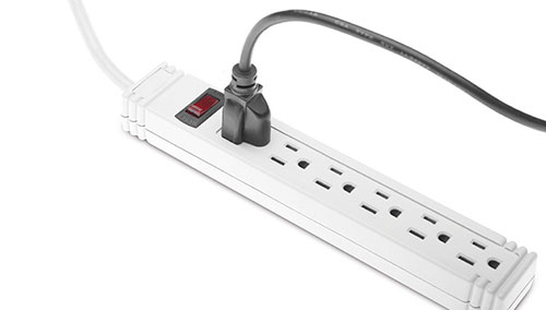One plug is connected to a power bar extension cord. One plug is connected to a power bar extension cord.